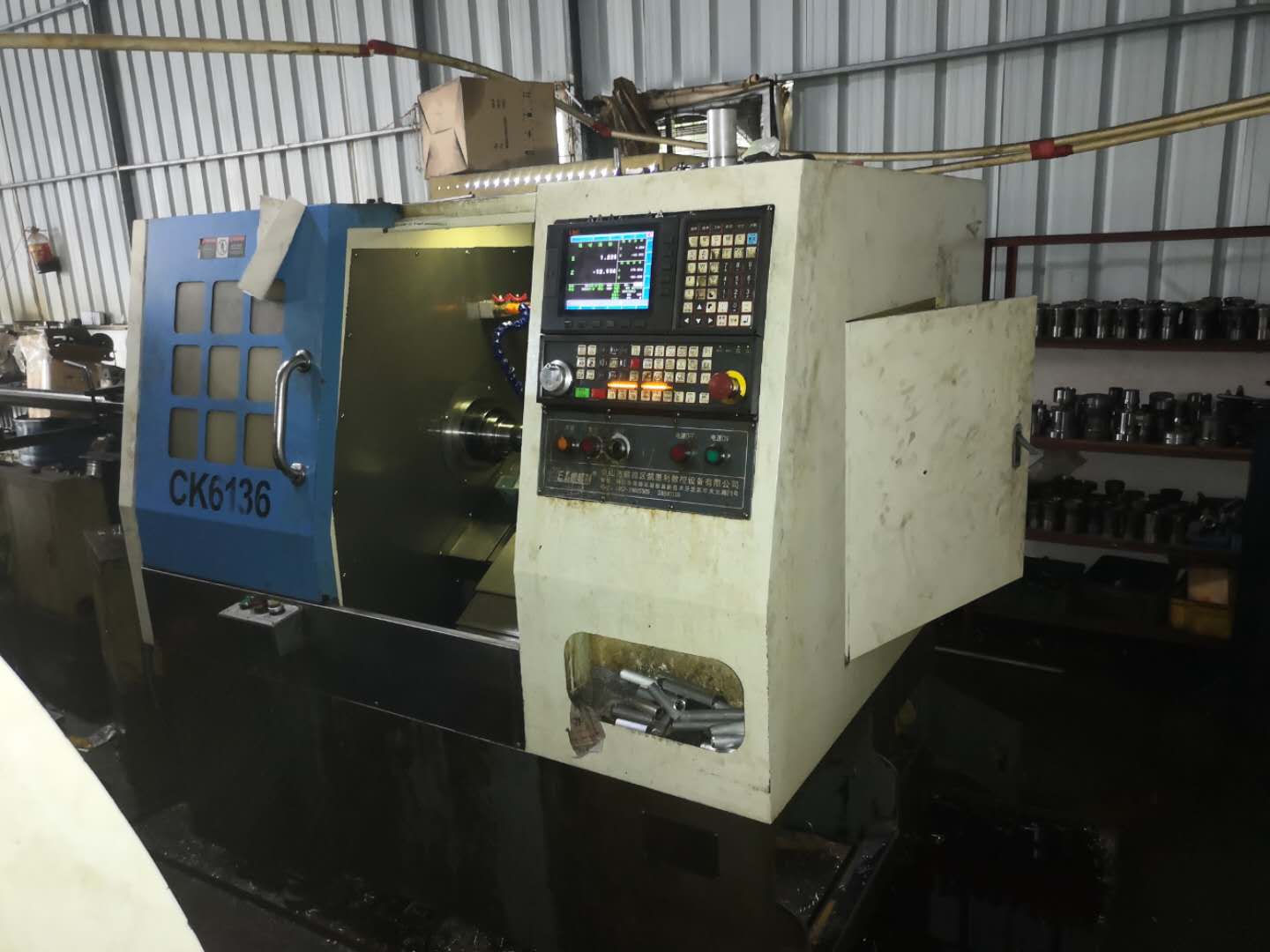 凱（kǎi）恩利數控車（chē）床（chuáng）36機放置在餘剛的（de）生產（chǎn）工廠內